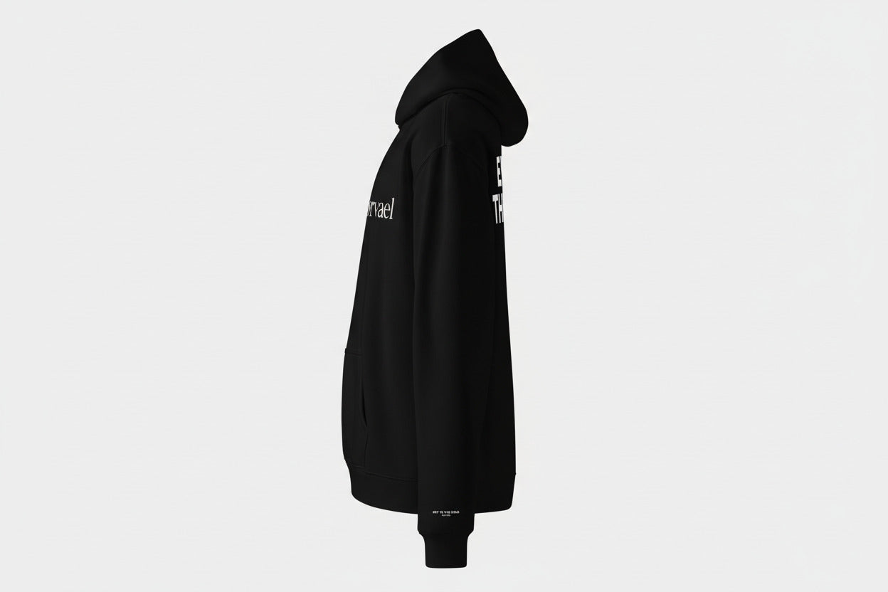 The "Enter The Cold" ritual hoodie by Nørvael. This black hoodie features the signature mantra printed in white across the back.