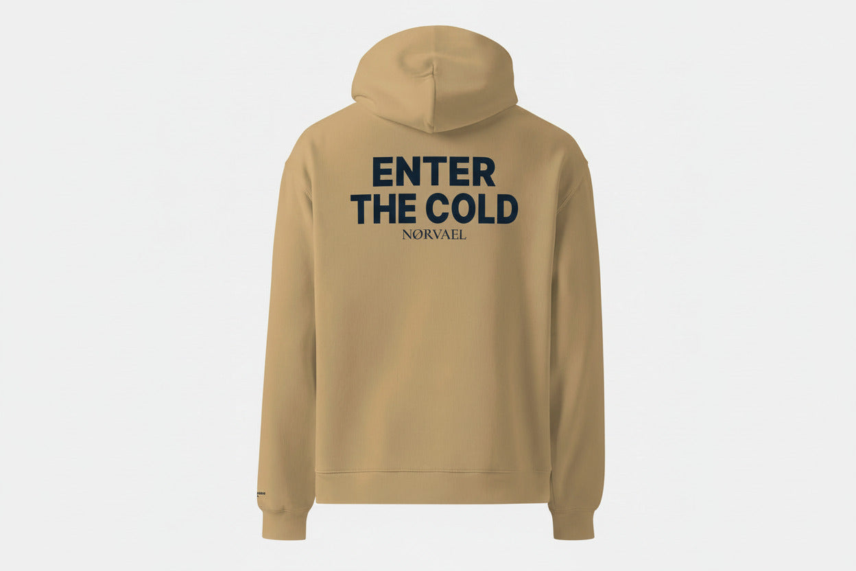 The deep blue "Enter The Cold" ritual hoodie by Nørvael. This sand hoodie features the signature print in blue across the back.