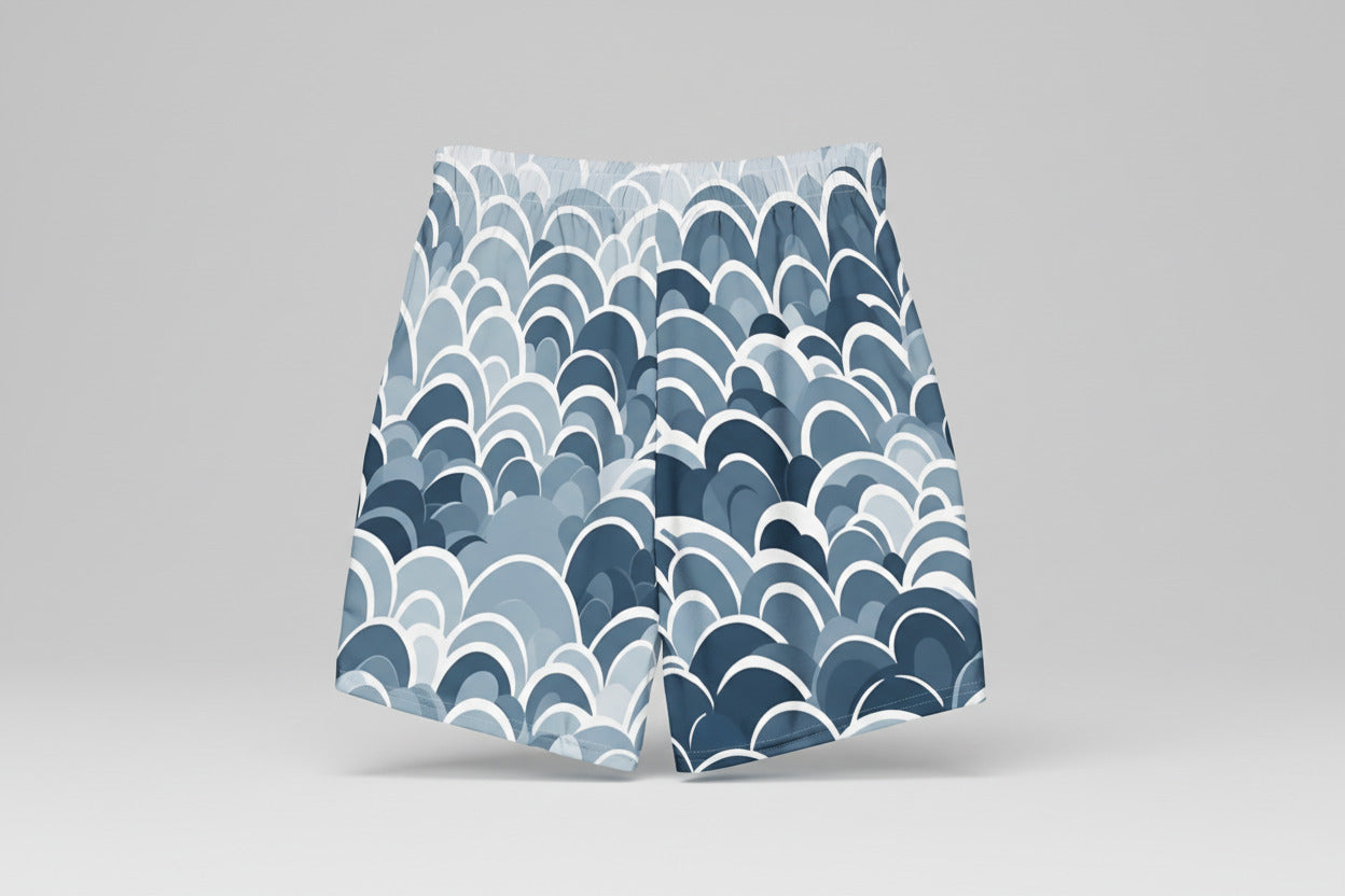 Designer men's swim trunks with blue arctic wave pattern and elastic waistband